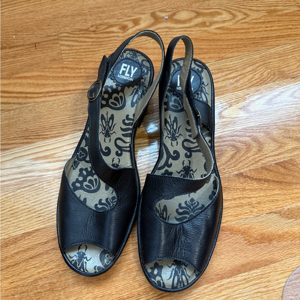 Fly London Black Sandals with Elegant Design